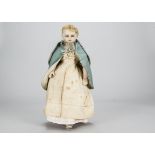 An English poured pale wax shoulder-head child doll, with blue glass eyes, insert blonde hair,