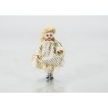 A Simon & Halbig all-bisque dolls’ house doll, with blue glass eye, socket head, blonde mohair
