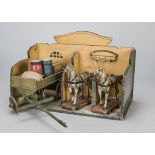 A good quality wooden stable, with two carved and painted wooden dapple grey horses with open