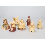 Seven pottery figures from Alice in Wonderland after the John Tenniel illustrations, comprising