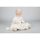 A Kammer & Reinhardt 100 type character baby, with blue painted eyes, open/closed mouth, blonde
