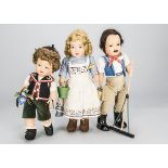 Three British felt dolls, a couple each with a bucket, he with dark mohair wig and moustache and