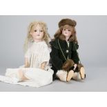 Two German bisque headed dolls, an Armand Marseille 390n with jointed composition body —21in. (53.