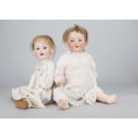 Two German bisque headed babies, a Porzellanfabrik Mengersgereuth 914 —19in. (48.5cm.) high; and