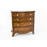 Nineteenth Century Apprentice Chest of Drawers, a bow front mahogany chest of four long drawers with