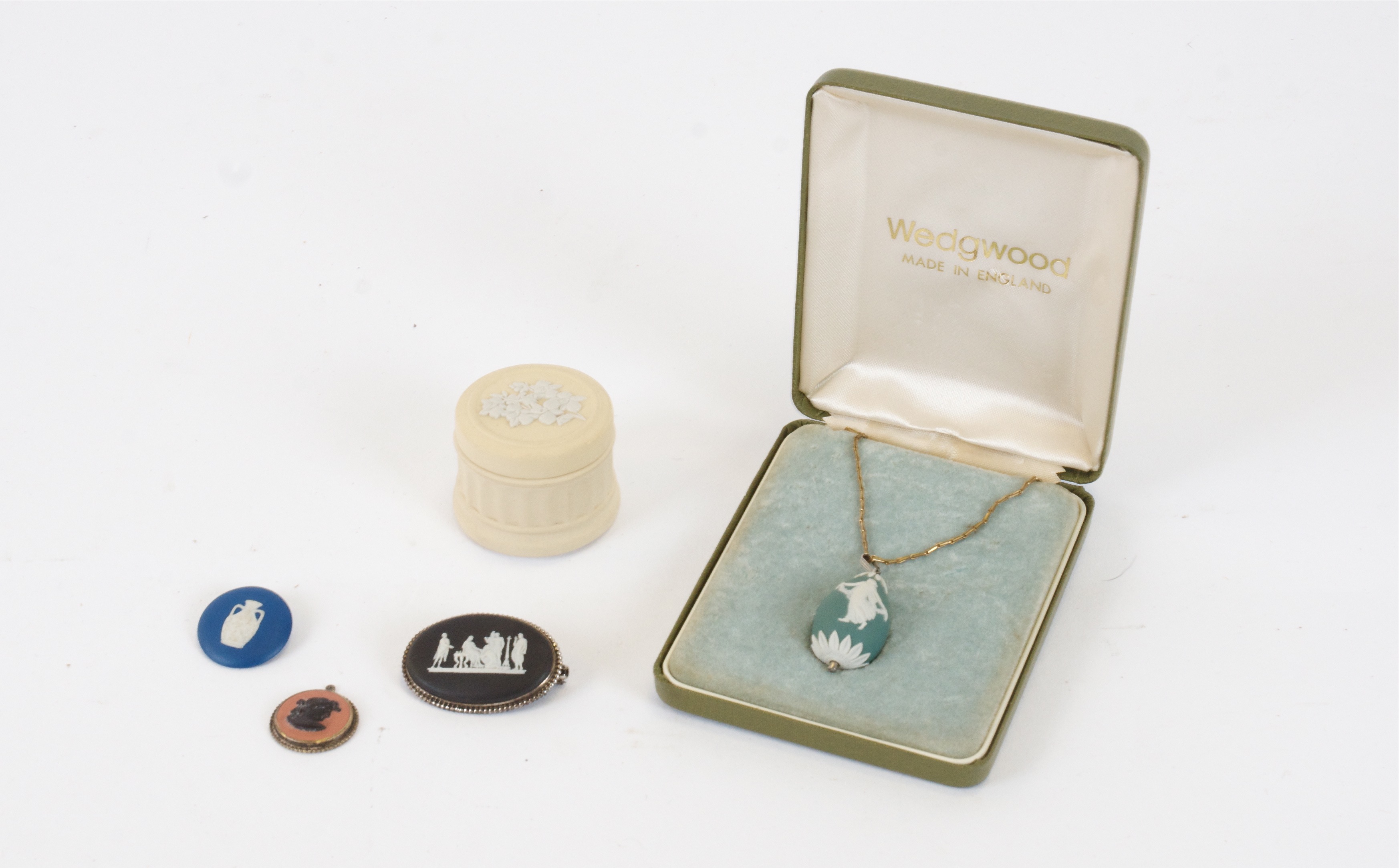 A small collection of jewellery mounting Wedgwood ceramics, to include a drop shaped pendant in jade