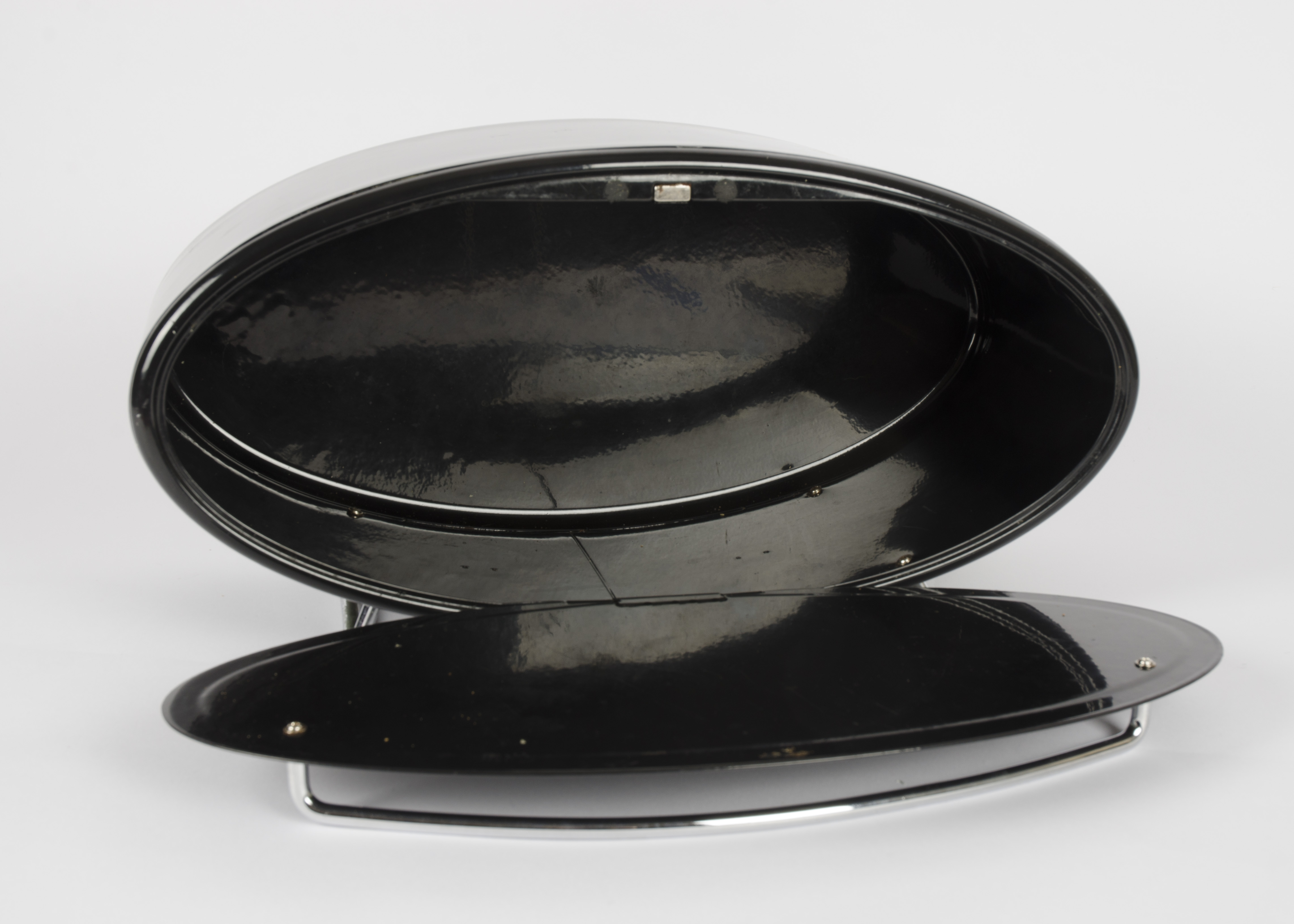 A retro 'Typhoon' oval black enamel bread bin, with a chromed handle pull down front, standing on - Image 2 of 2