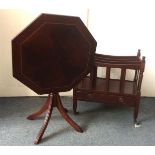 A contemporary mahogany Canterbury, together with a contemporary octagonal tripod tilt top table (2)