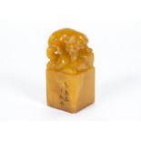 A late 19th/early 20th Century Chinese soapstone weight, the terminal fashioned as a panther,