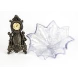 A large piece of decorative glass, diameter 55.5cm, together with a clock standing on four feet with