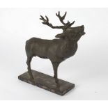 A spelter statue of a stag, standing on a marble base, his head raised upwards as if alerted to