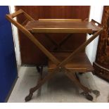 A Butlers tray trolley, with two trays and on castor feet, 210 cm x 80 cm x 55 cm