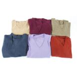 A quantity of v neck jumpers, including a tan jumper (M), lilac jumper (M), rust coloured jumper (