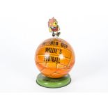 A 1966 Wold Cup Willie's Lovell's toffee tin, in the shape of a football topped with a lion