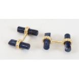 A pair of gilt cufflinks, mounting lapis lazuli