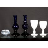 A pair of Thomas Webb Bristol blue candlestick holders, height 18 cm, together with several