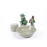 A Chinese famille verte Kylin resting upon a pierced sphere, together with a celadon glazed bowl