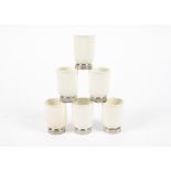 Keith Murray (1892-1981) for Wedgwood set of six beakers, in the 'Moonstone' glaze range, the