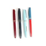 Two Parker fountain pens, 14ct nibs and plastic bodies in red and dark blue, used, together with