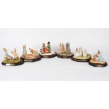 A group of Royal Doulton and Beswick figures, all with rabbits as the subject matter, some from