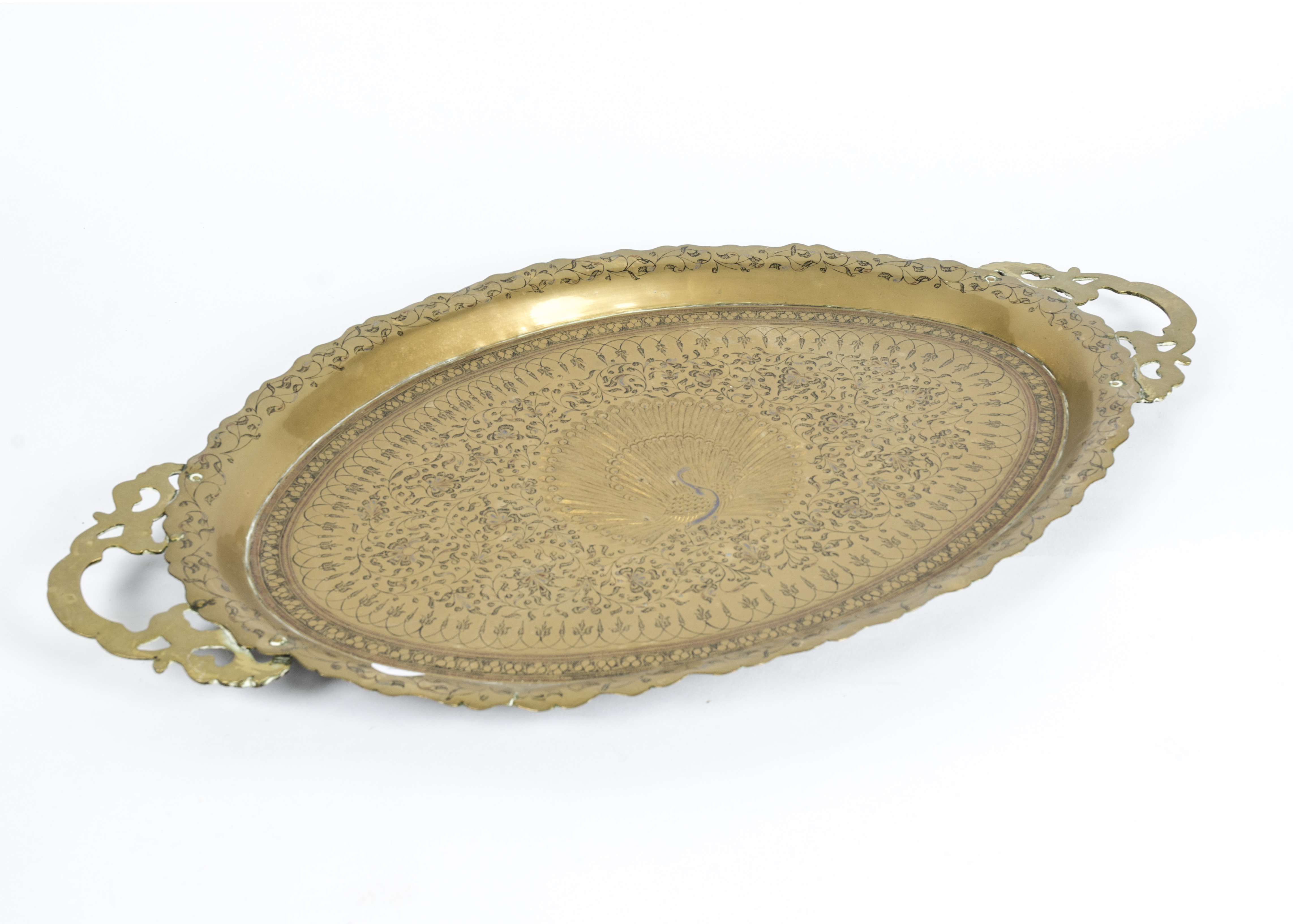 Two large Middle Eastern brass trays with peacocks as the central motifs, 65 cm long and the other - Image 2 of 3