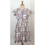 A vintage 1940's ladies lilac dress with a printed floral design, with a pleated skirt and