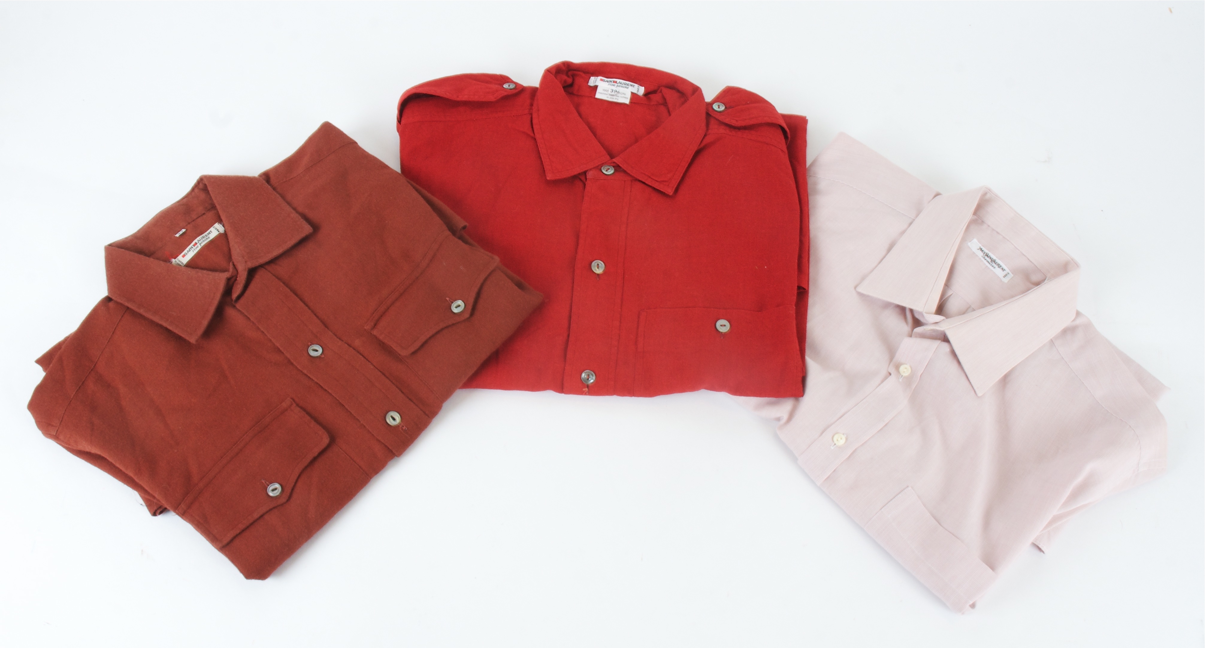 Three gentlemans' Saint Laurent shirts, including a rust coloured example from the Viyella range (