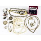A large quantity of costume jewellery, including two sets of herringbone necklaces and earrings,