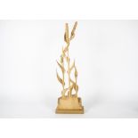 A sycamore carving by J.B Smith, in homage to Robert Mouseman Thompson, a field of wheat with