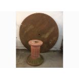 A reconstituted stone circular garden table, on reeded column base, very heavy, 73cm high x 157cm