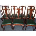 A set of seven early 20th Century Queen Anne style dining chairs,