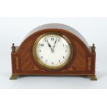 An early 20th Century eight day mantel clock, the surround with inlaid crossbanded decoration, on