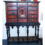 A 19th Century continental scarlet tortoiseshell and inlaid cabinet on stand, in the 17th century