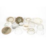Victorian and Later Jelly Moulds, a collection of fourteen including, earthenware, stone ware, glass