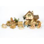 A collection of Pendelfin figures, including 'Poppet', 'Twins', 'Rolly', 'Thumper', 'Blossom', '