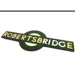 A Southern Region Target Station Sign 'Robertsbridge', an enamelled original station sign,