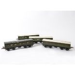 Four Hornby O Gauge No 2 Corridor Coaches, all in SR green, comprising two 3rd class coaches, one