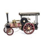 A Markie Models 1" Scale Live Steam Traction Engine, finished in crimson and black, with single