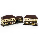 Two Bub Post-war O Gauge Stations, both brightly-printed with buff walls, florid window boxes,