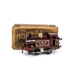 An Early Boxed Hornby O Gauge Clockwork No 1 Tank Locomotive, in LMS crimson as '0-4-0', with non-