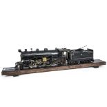 A Vintage American-style Gauge I Live Steam Coal-fired 2-6-2 Locomotive and Tender, evidently to the