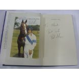 Horse Racing, Champions Story, a book by Bob Champion and Jonathon Powell. The book is signed by