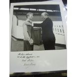 Manchester Utd, Denis Law, an autographed silver gelatine print in 1962, showing Law and Matt Busby,