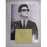 Pop Music, Roy Orbison, a signed album page, together with a black/white photograph, formerly the