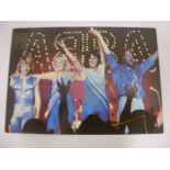 Pop Music, ABBA, a fully signed colour postcard of the famous group