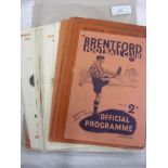 A collection of 53 London clubs home football programmes, in various condition, 32 Brentford, from