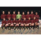 MANCHESTER CITY Autographed colour 12 x 8 photo, showing Manchester City players posing for a