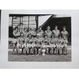 LIVERPOOL AUTOGRAPHS 1974 A 20" X 16" black & white team group including the 12 players plus Bill