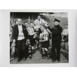 SUNDERLAND / 1937 FA CUP FINAL A 24" X 16" silver gelatin photograph of Carter being chaired and