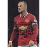 WAYNE ROONEY AUTOGRAPHS Three 12" x 8" colour photographs of Wayne Rooney. Two are of Wayne in a